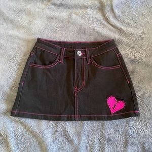 DOLLSKILL GRAVE GIRLS mini skirt with pink stitch, designed with two pink hearts